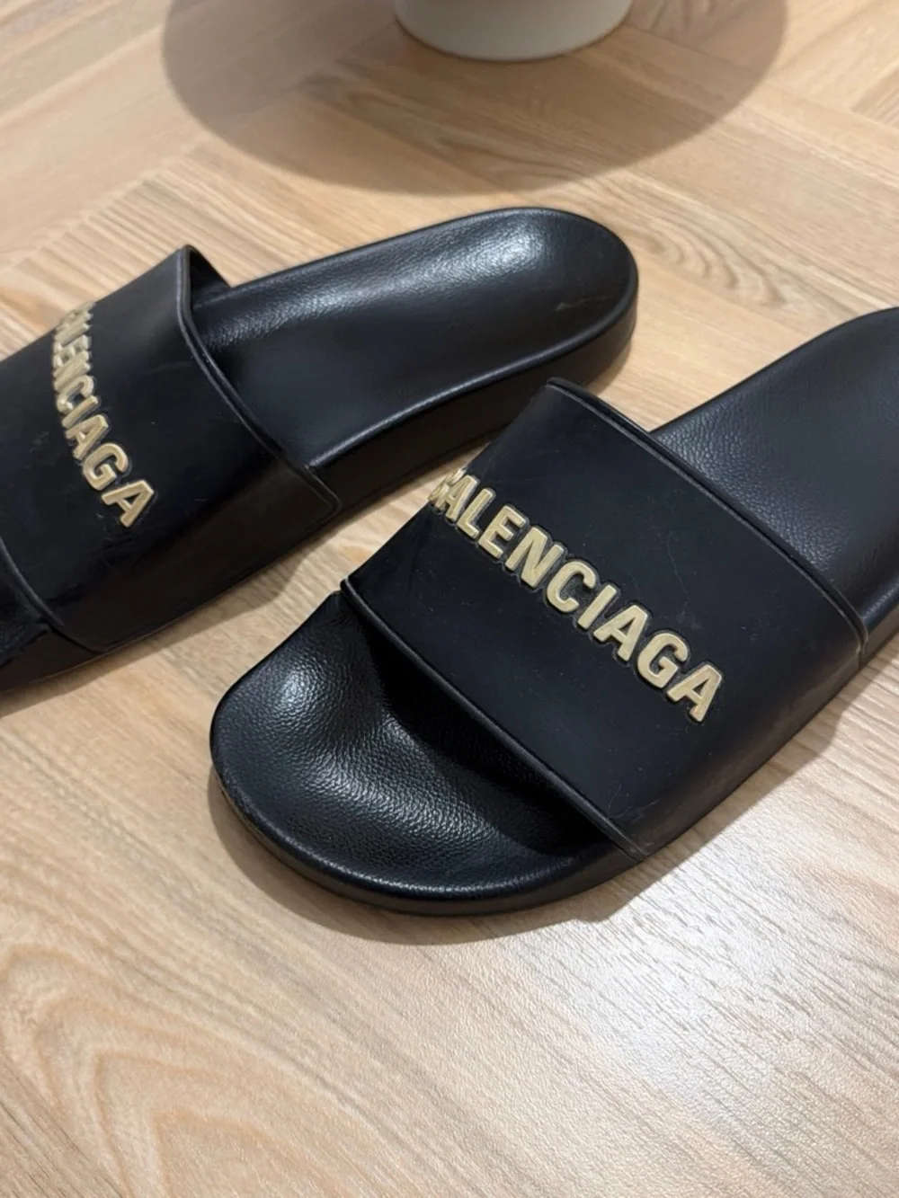 Balenciaga Black Slides with Gold Logo